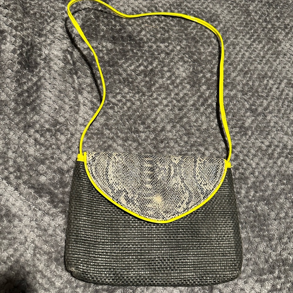 The cutest purse with snake leather and black embroidered material 13” w x 10”H